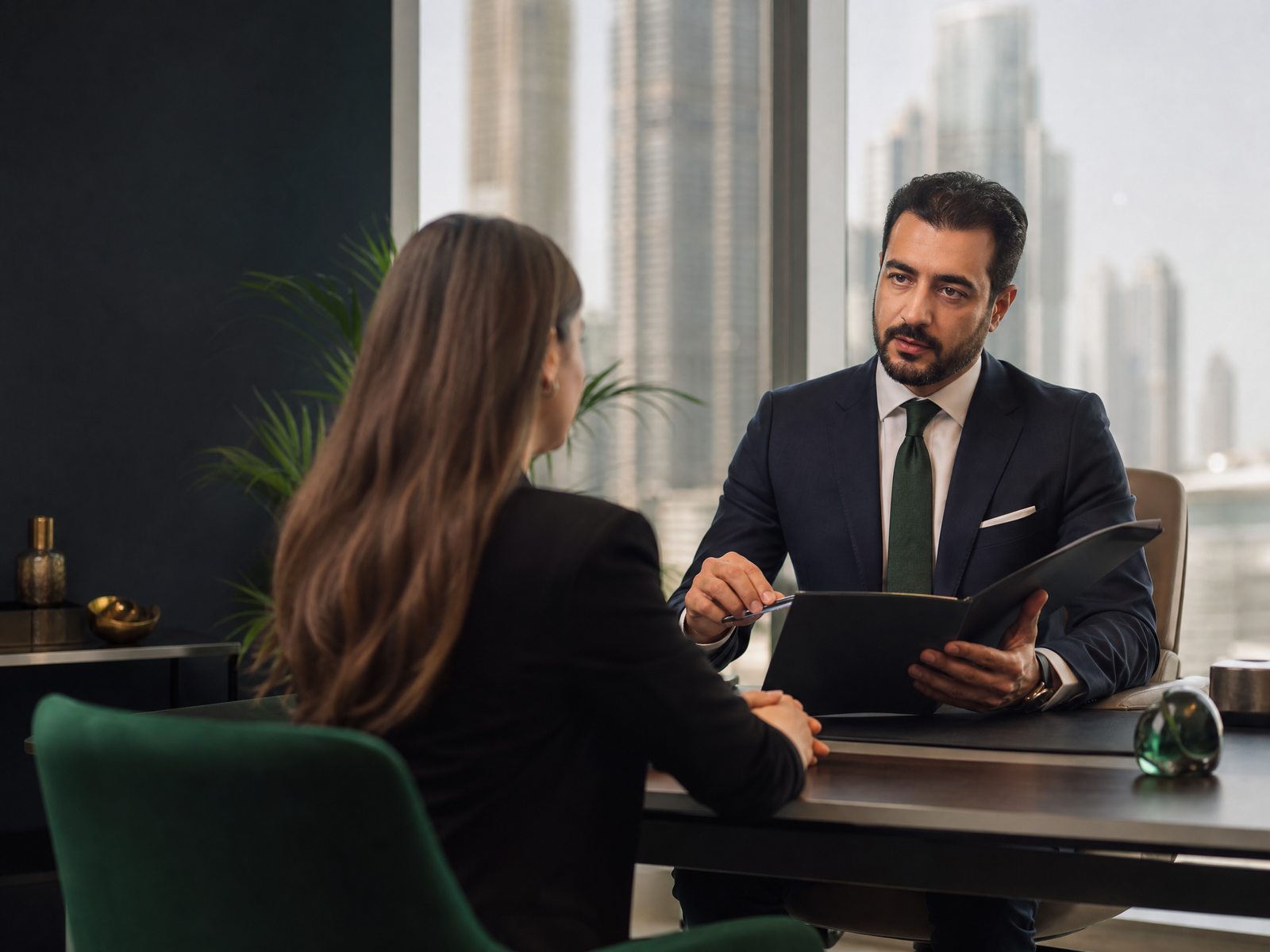 Recruitment professionals discussing candidate selection for a UAE business